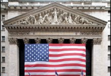 Wall Street Mixed dengan Hanya Dow Jones Positif, Saham Emas Melonjak ke Posisi Rekor